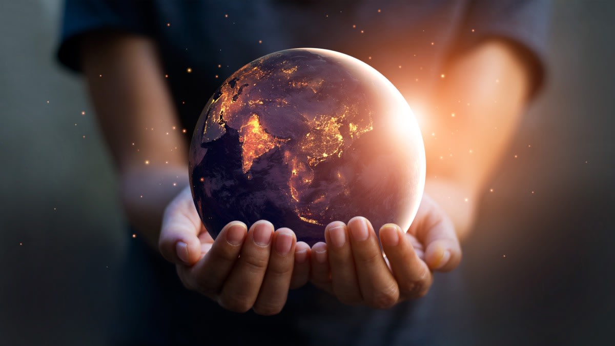 https://res.cloudinary.com/momentum-media-group-pty-ltd/image/upload/v1679355746/Money%20Management/globe-hands-mm_zm0853.jpg