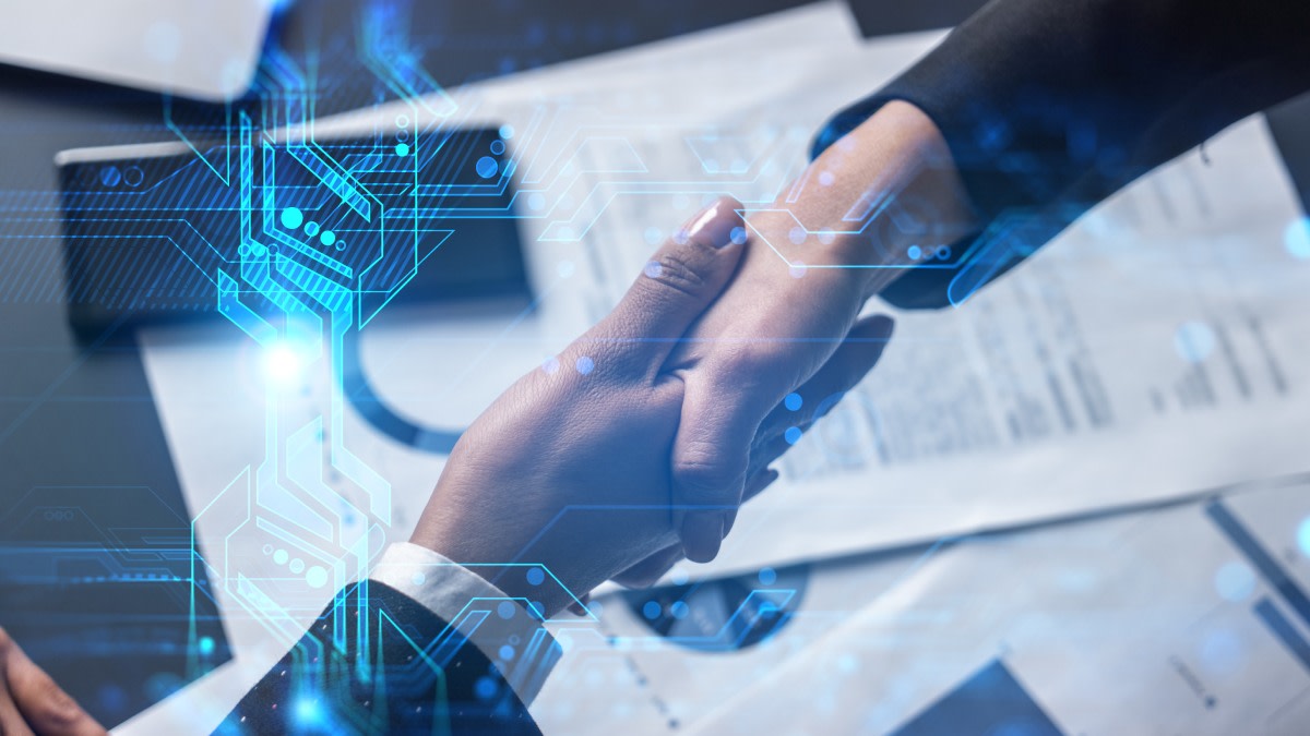 https://res.cloudinary.com/momentum-media-group-pty-ltd/image/upload/v1680050519/Money%20Management/cyber-tech-handshake-mm_omwde7.jpg