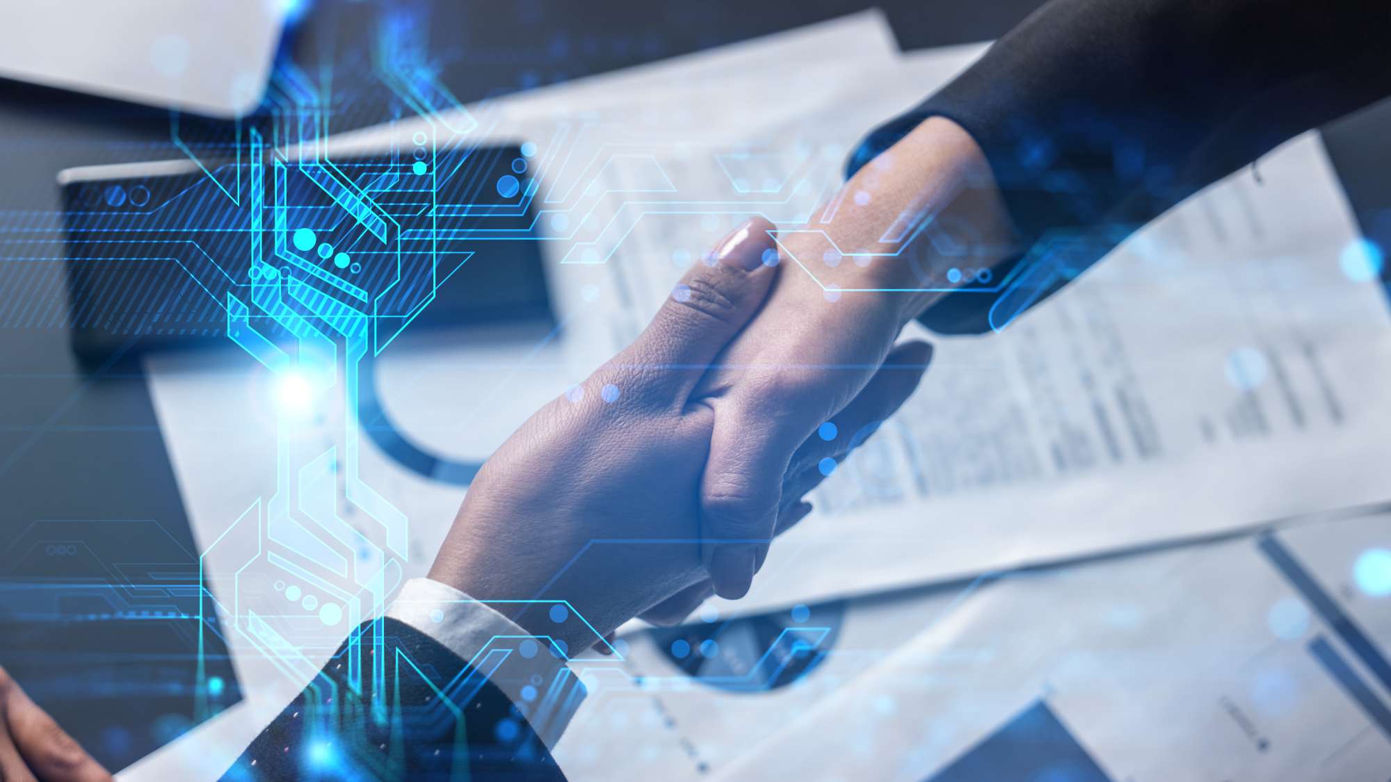 https://res.cloudinary.com/momentum-media-group-pty-ltd/image/upload/v1683075700/Money%20Management/cyber-tech-handshake-2-mm_bzpfj2.jpg