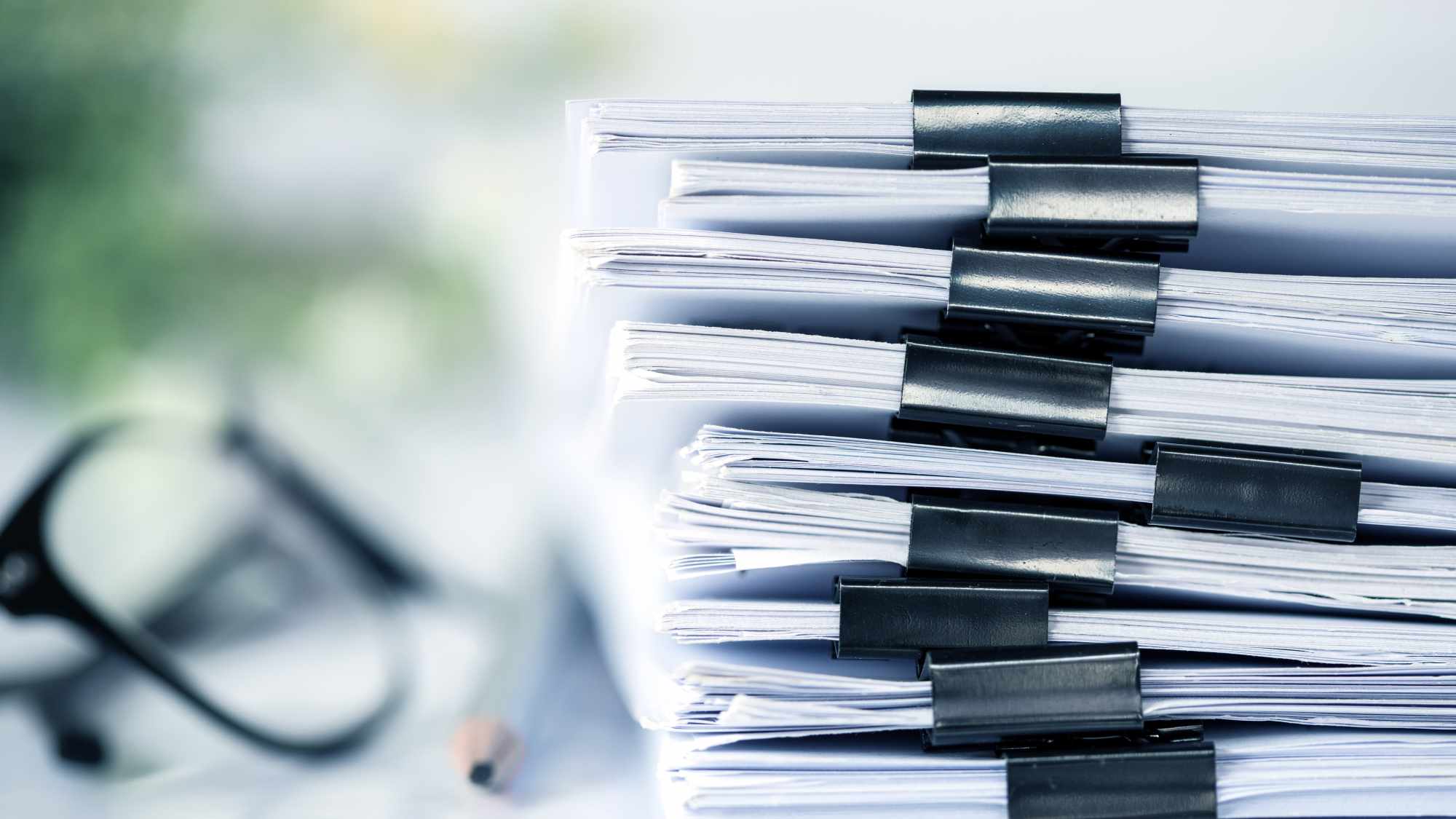 https://res.cloudinary.com/momentum-media-group-pty-ltd/image/upload/v1683782439/Money%20Management/documents-piles-mm_n7aoay.jpg