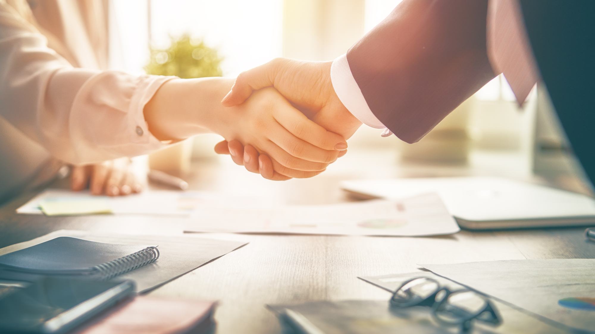 https://res.cloudinary.com/momentum-media-group-pty-ltd/image/upload/v1687133262/Money%20Management/woman-handshake-mm_yl7is5.jpg