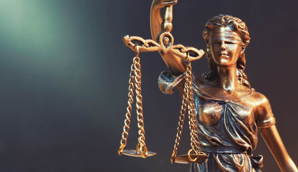 Reprimand for principal who employed disqualified lawyer