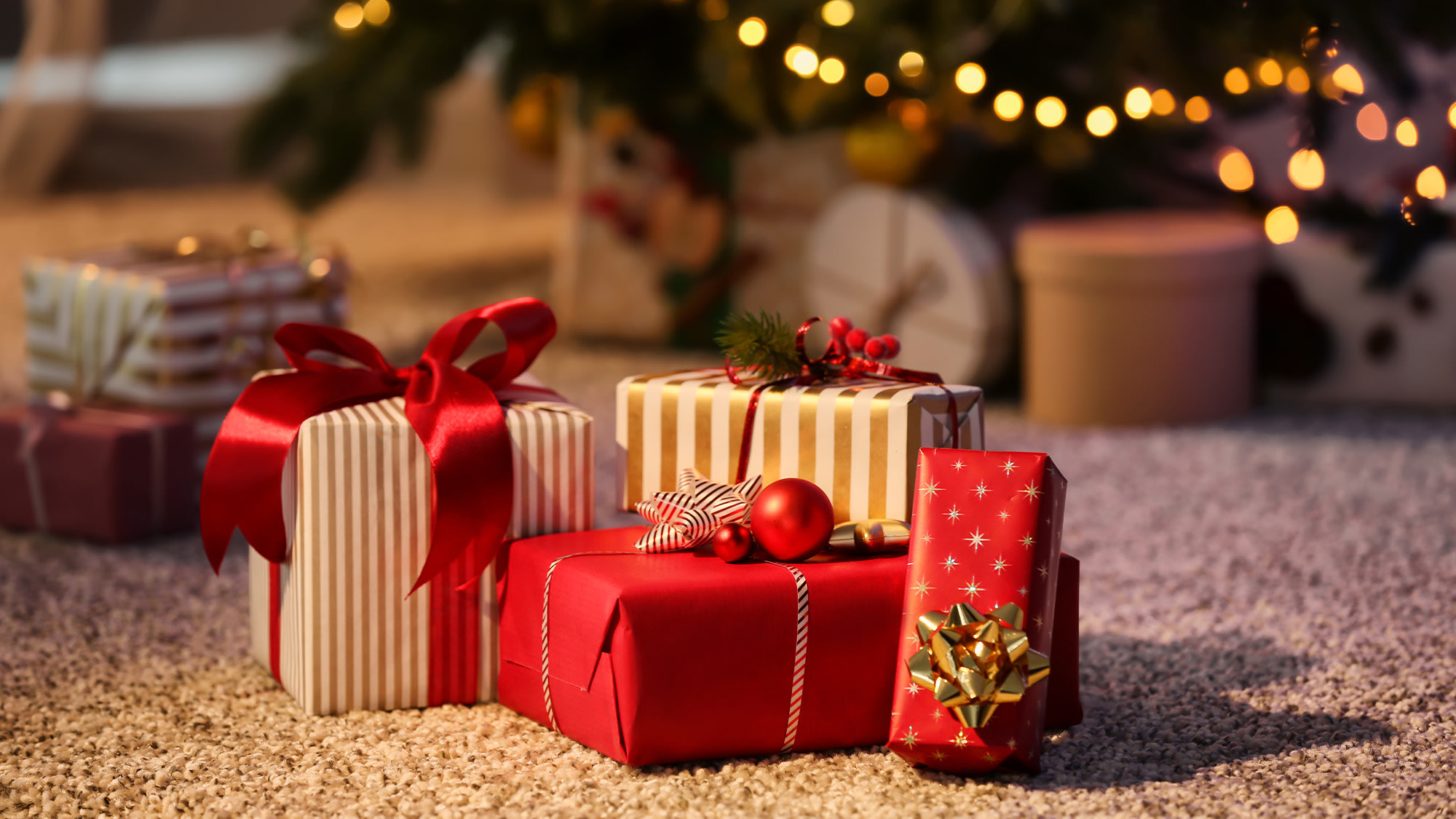 https://res.cloudinary.com/momentum-media-group-pty-ltd/image/upload/v1726014169/Money%20Management/christmas-gifts-mm_rt6ds2.jpg