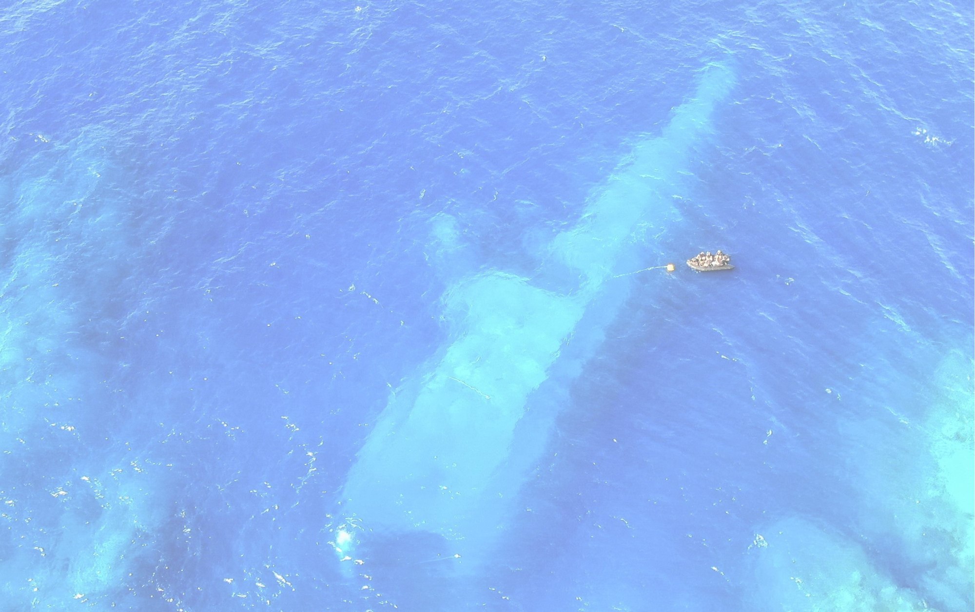 NZDF continues container, oil removal at sunken HMNZS Manawanui