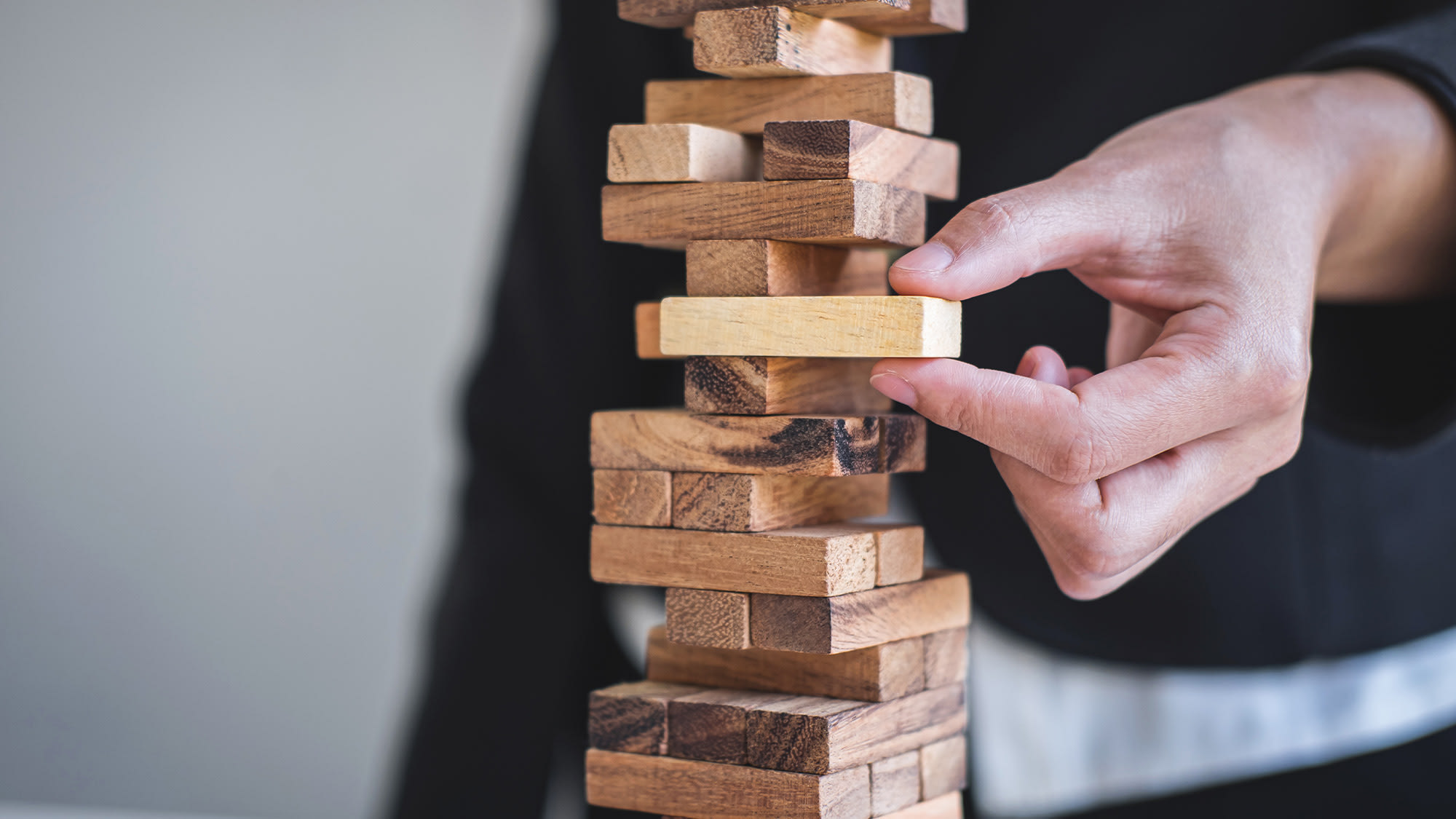 https://res.cloudinary.com/momentum-media-group-pty-ltd/image/upload/v1731909263/Money%20Management/jenga-blocks-mm_fs0tkb.jpg