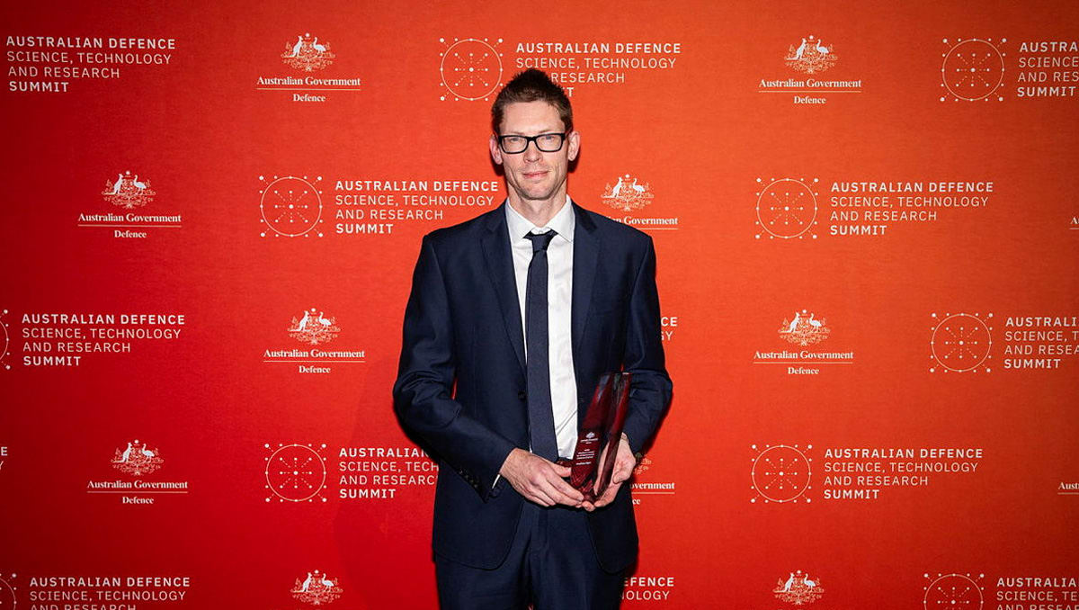 Australian defence scientist Andrew Hart working on rocket propulsion technology in laboratory setting