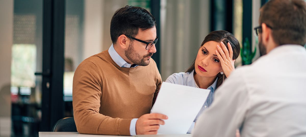 worried couple agent meeting ta nbwtjm