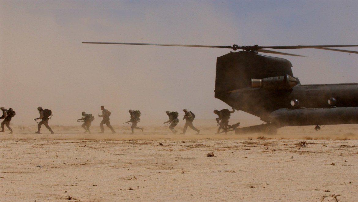 JPAU22APR03JC03 OPERATION FALCONER Pic By: JNCCaption:Australian Army soldiers from theTownsville-based 5th Aviation Regiment provide the Coalition Forces in the Middle Eastern Area of Operation (MEAO) with a medium lift capability as they transport troops and equipment. The Chinook (CH47) has the capacity to lift up to 11.7 Tons, carrying internal and/or external loads, or 30 combat troops. Over time, the Chinook has consistently proven to be a reliable and capable aircraft having been used in conflicts such as the Falklands and the Gulf war and now Operation Falconer.The CH 47 aircraft has proven itself working with the Australian Armys 3rd Brigade in providing essential support to deployed elements as is commonly referred to as the work-horse of the Armys helicopter regiment. While the Chinook helicopter has been in service since the Vietnam Conflict, this variant remains one of the latest additions to the Australian Armys aviation capability.