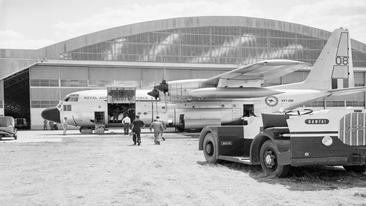 000-142-581_2A97-208 Lockheed Hercules on tarmac at Avalon, with the RAAF's first A3 Mirage, A3-1, inside after its arrival from France.Date/Time 27NOV63UNCLASLocation Avalon