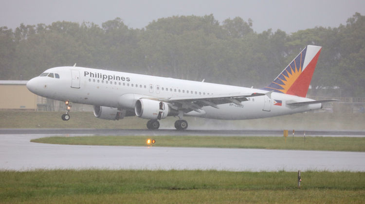 Philippine Airlines Airbus A320 touches down at Cairns Airport. (Andrew Belczacki)