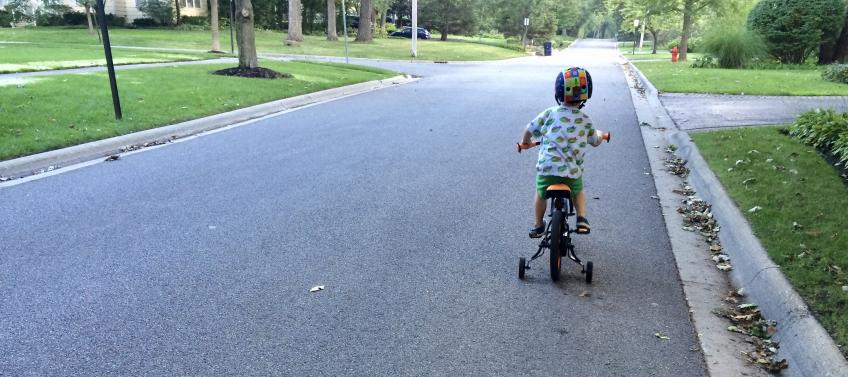 lead image for A Chicago Mom's Guide to Teaching Kids How to Ride a Bike