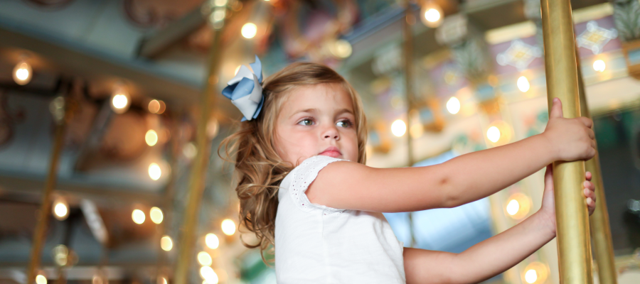 Parent and their children playing carousel at Mid Valley shopping