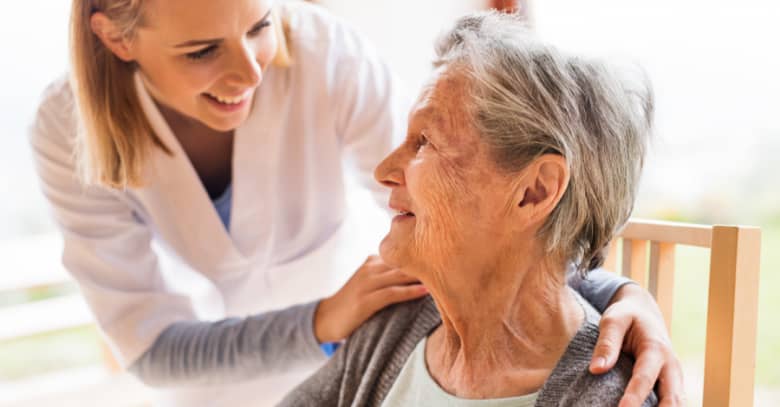 An in-home caregiver checks in on one of her patients