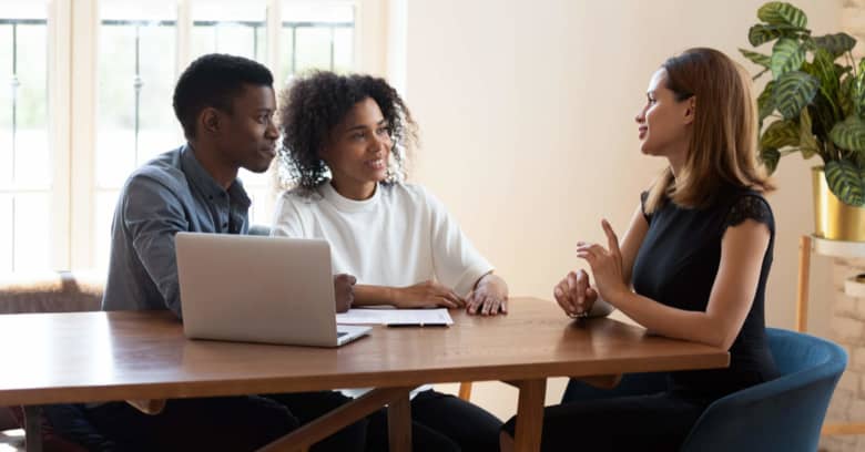 Parents who have a child with disabilities speaks with a financial advisor