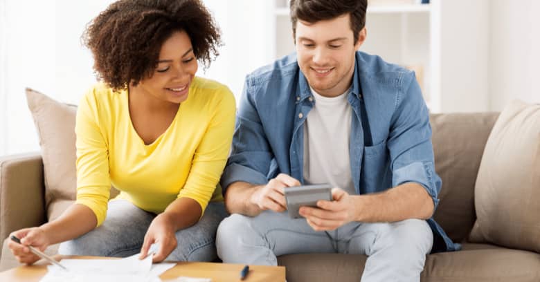 A couple works on their finances to see what they can afford