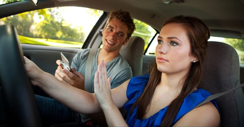 man and woman inside a car