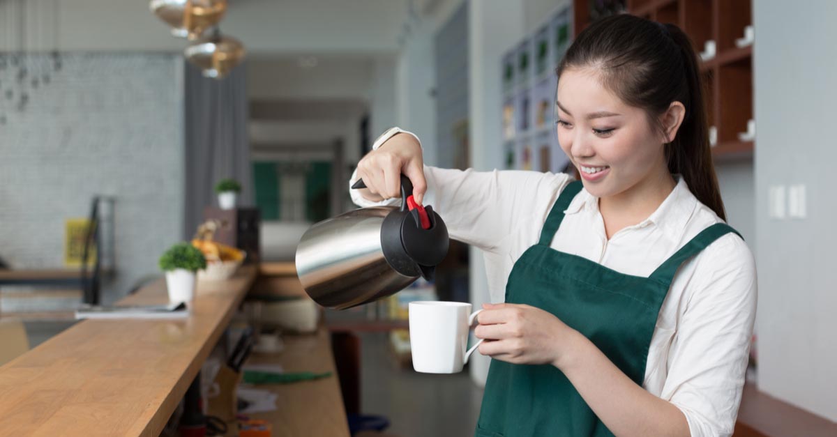 Woman working part time at a coffee shop