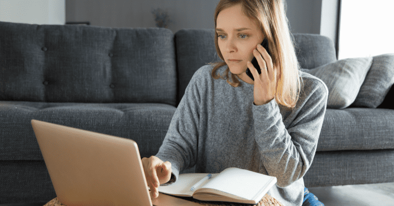 A woman uses her computer to research car insurance