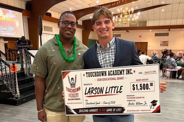 Award recipients celebrated on stage with Touchdown Academy leadership