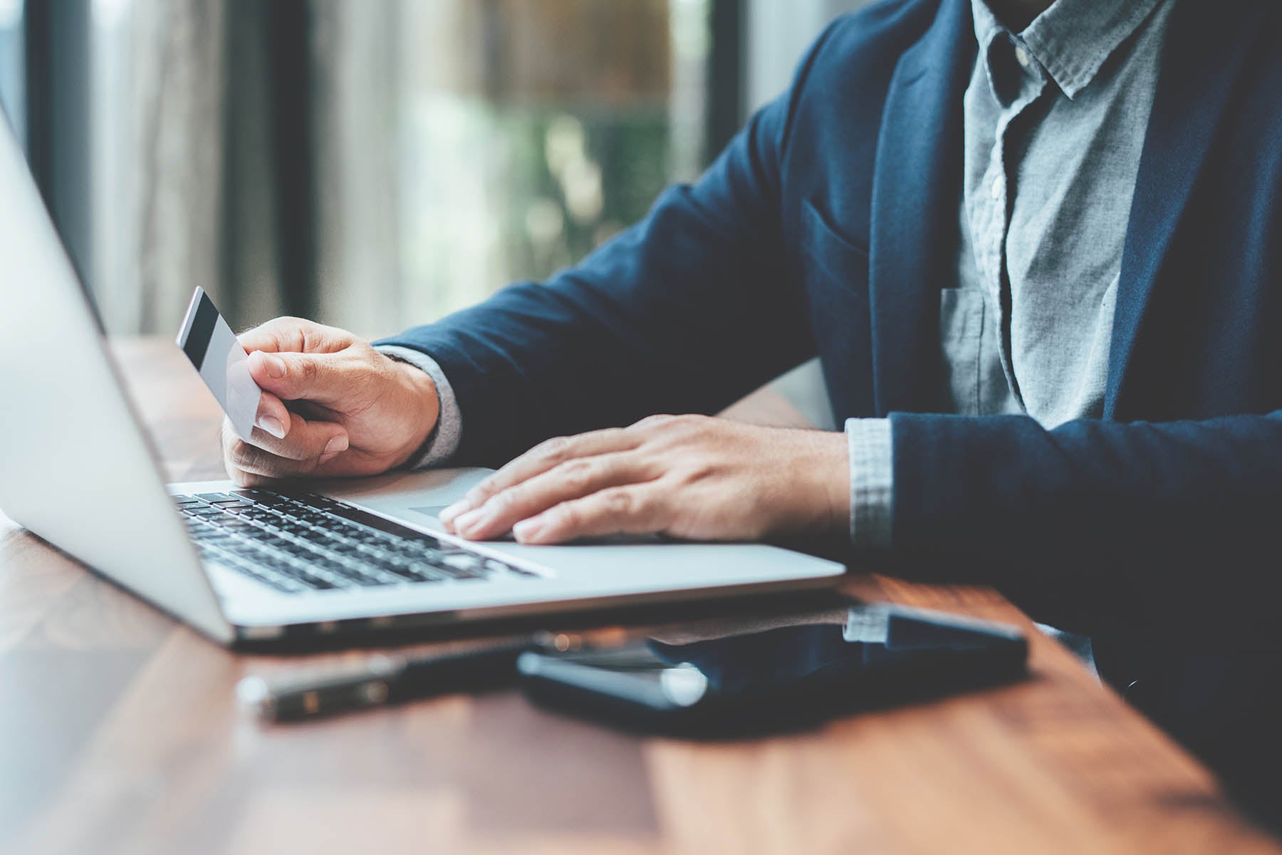 Man purchasing on laptop