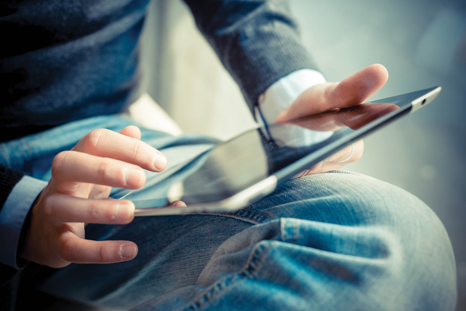 Man holding iPad