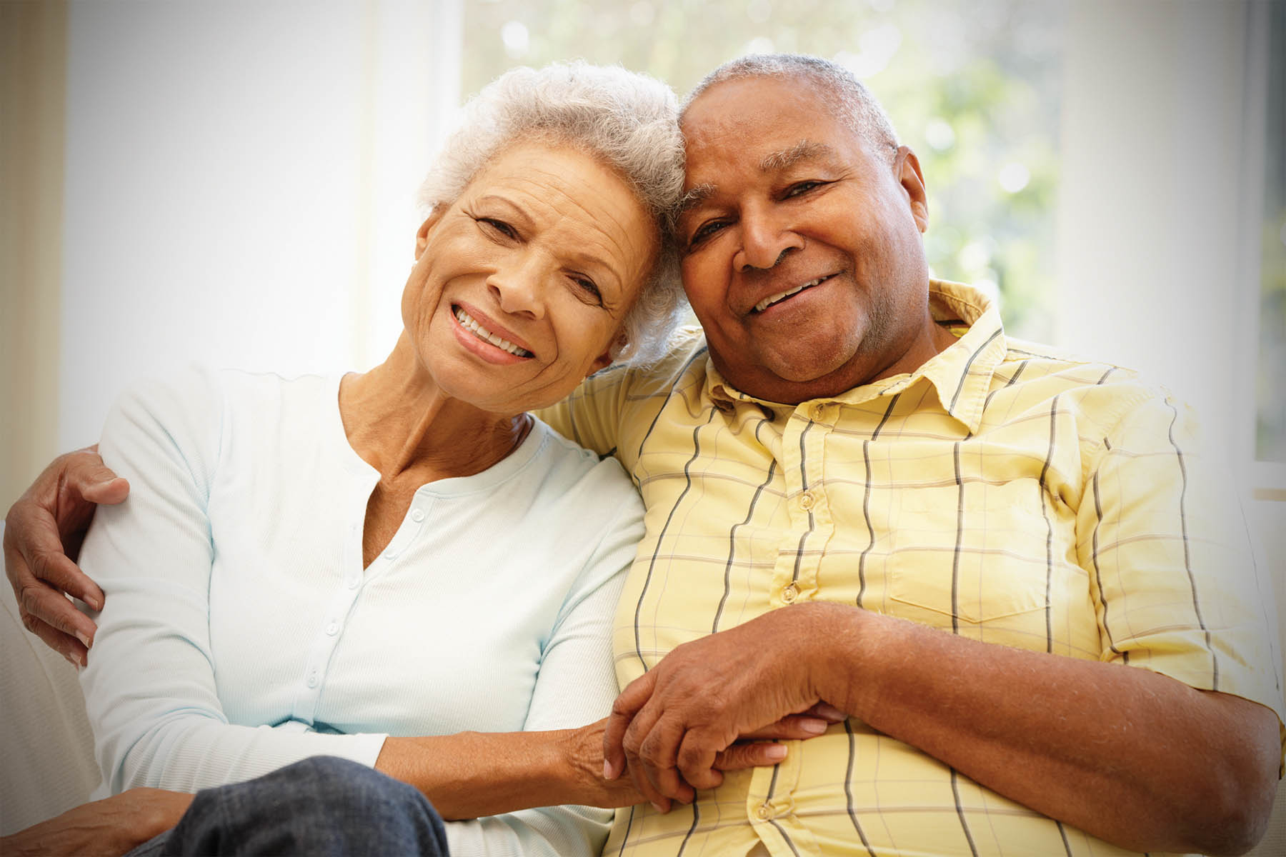 grandparents holding hands for a photo