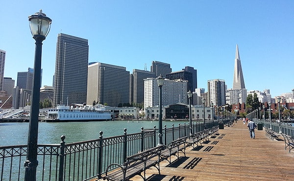 A long pier, looking back towards San Francisco