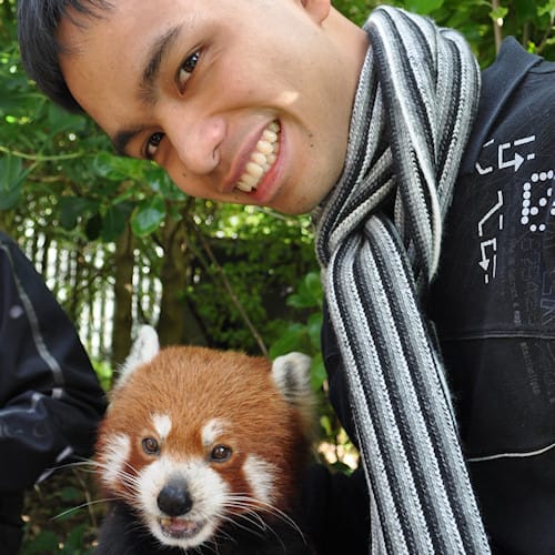 Me with a red panda from the Wellington Zoo.