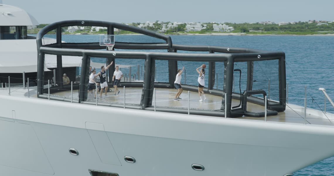 Men and Women Playing Basketball on the Deck of a Yacht