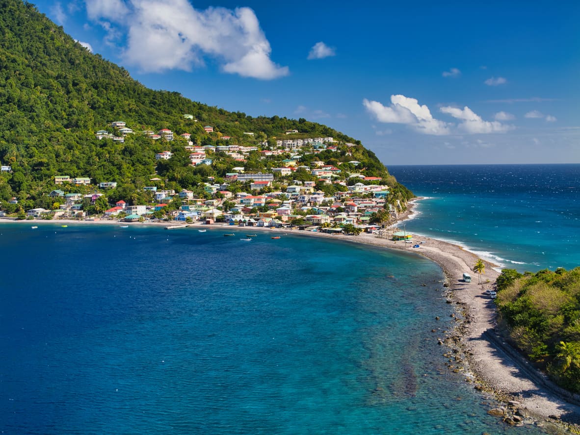 The village of Scotts Head on the southern coast of the Caribbean island of Dominica. Taken from the top of Scotts Head Peninsula or Cachacrou on a clear, sunny day.