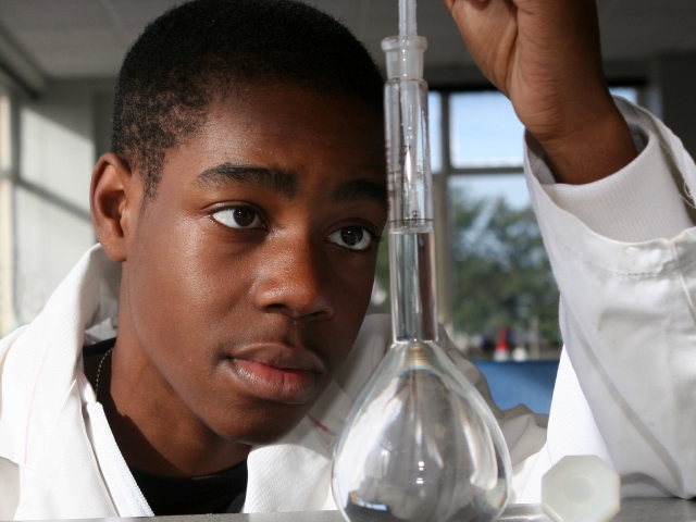 Kid with a burette