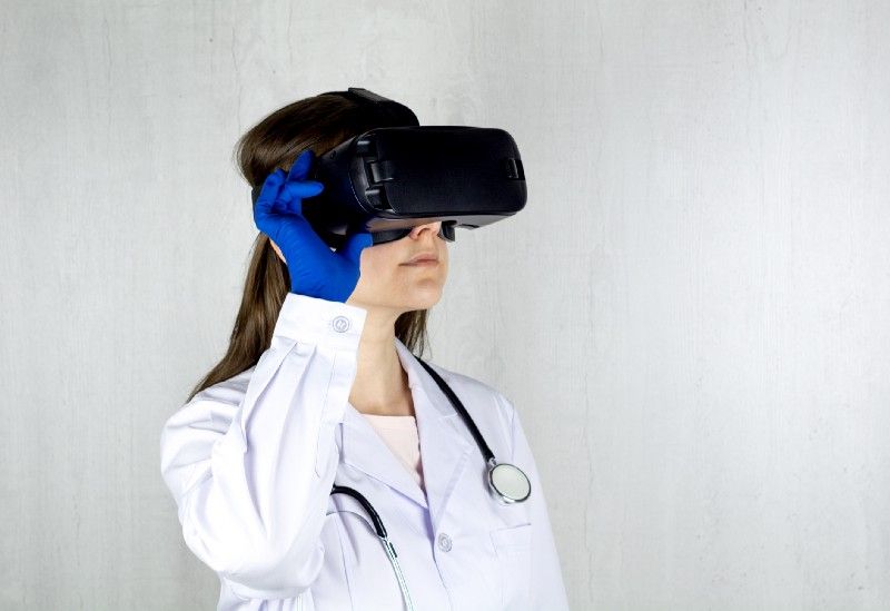 Doctor wearing VR headset