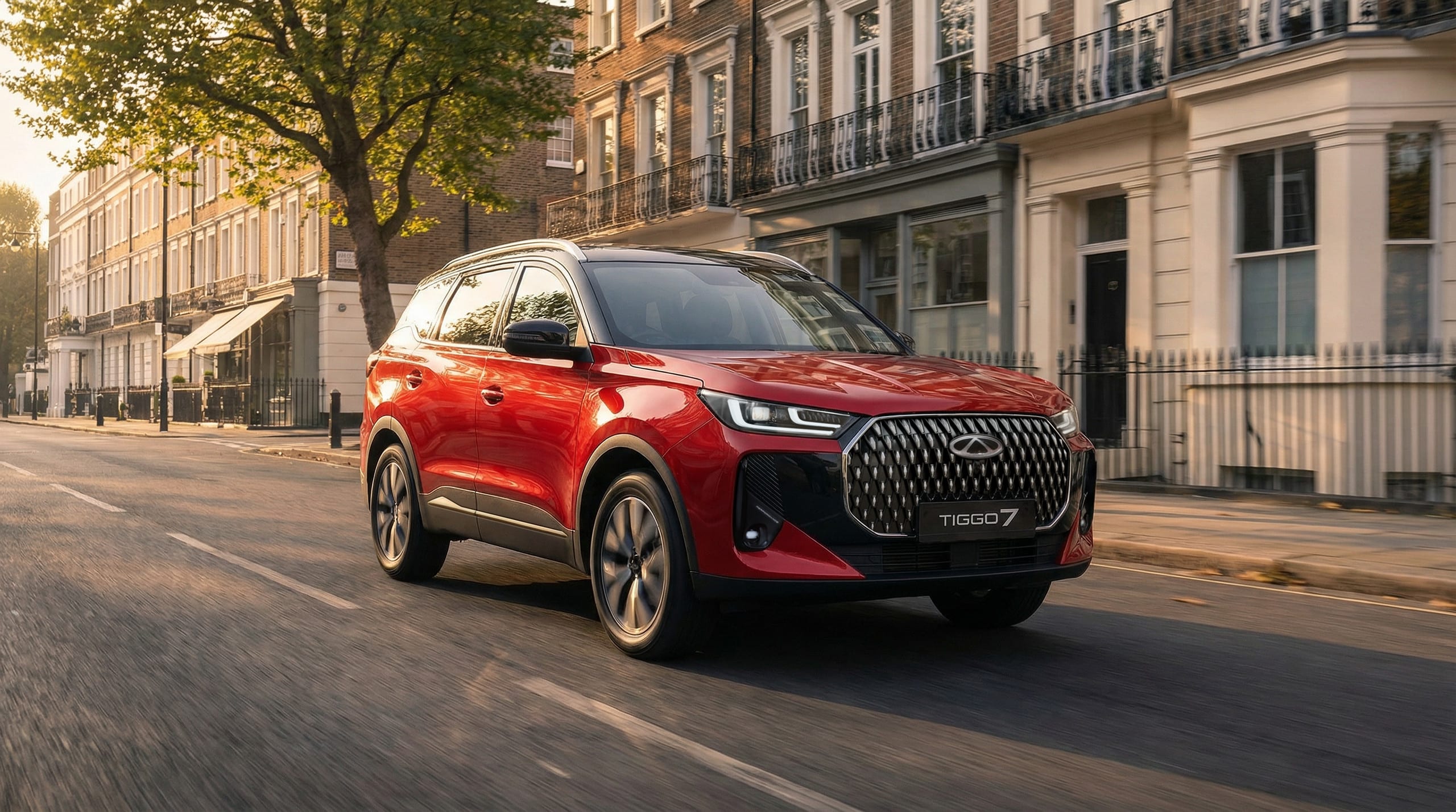 Chery TIGGO 7 in red driving along a city street