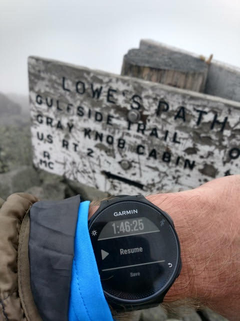 Ben's watch at the summit sign