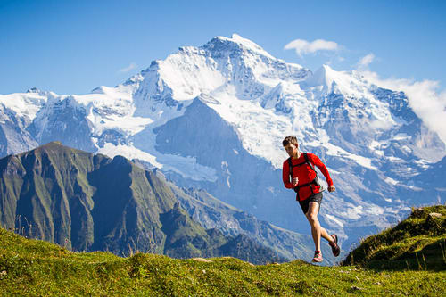 No, that's not Mount Adams. Jim forgot to take a photo of himself on the top of Adams… so we added one of him running in the Swiss Berner Oberland. Courtesy of Patitucci Photo.