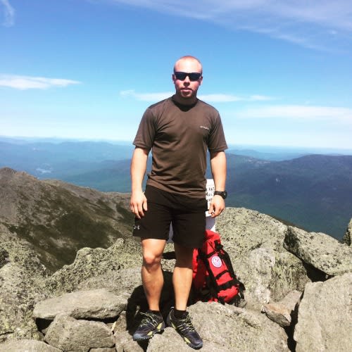 Myles at the Summit Sign