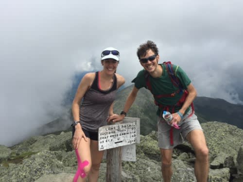 Matthew and Caitlyn at the Summit Sign