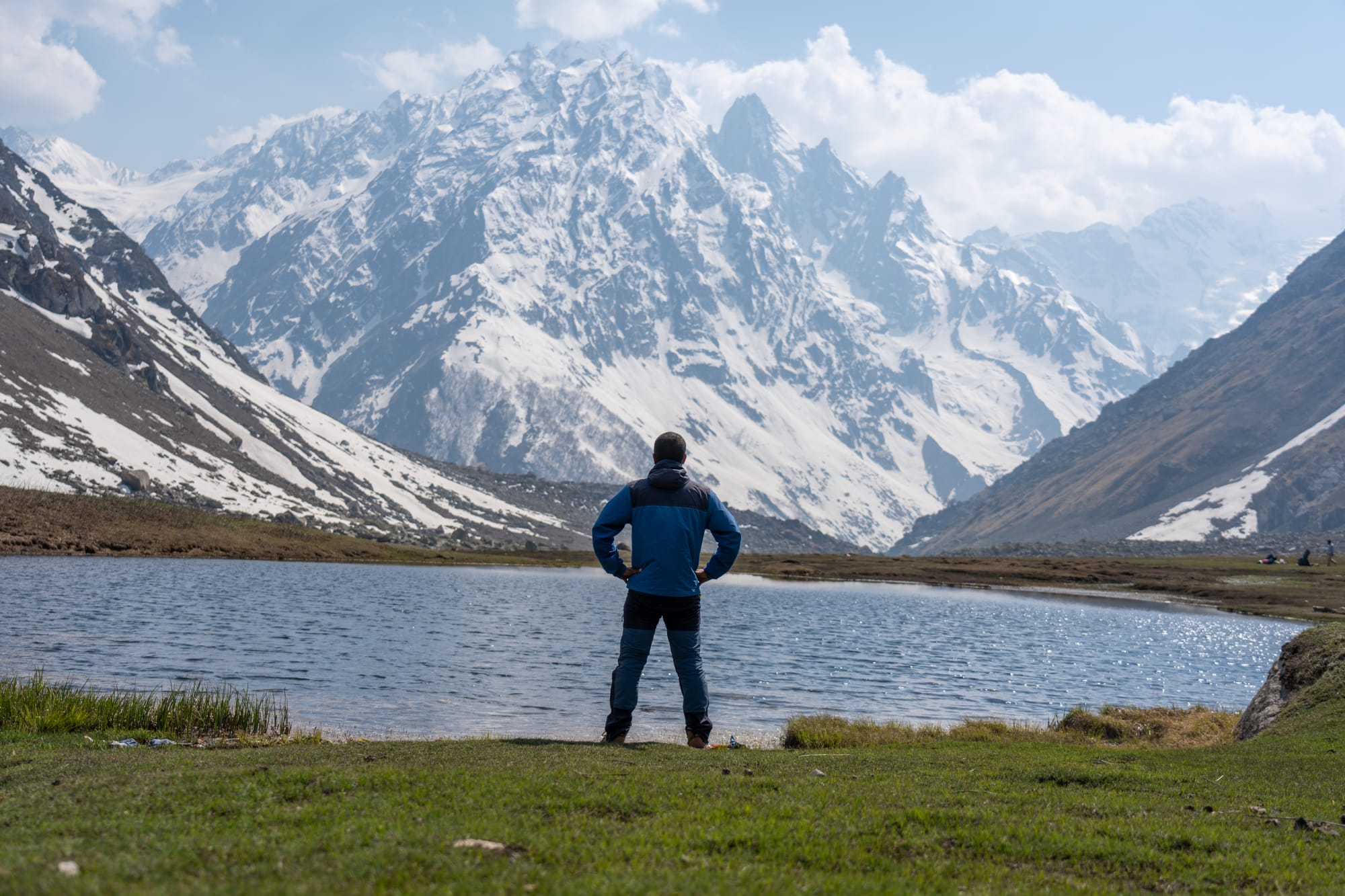 a person standing in front of Kara lake