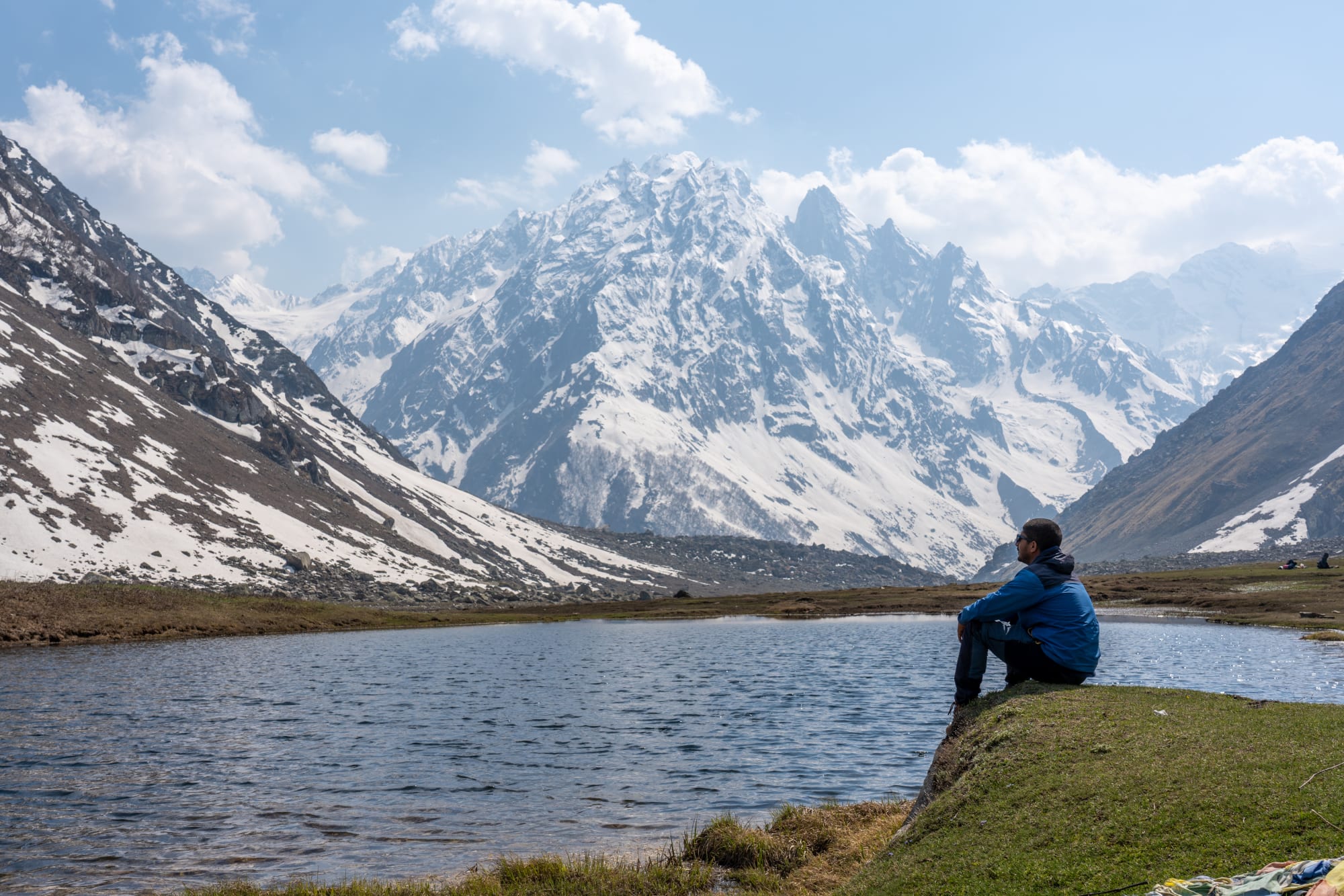 a person sitting in front of Kara lake