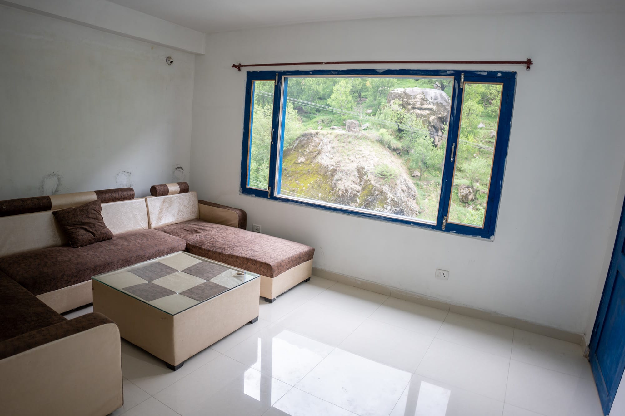 Living room with couch and view outside