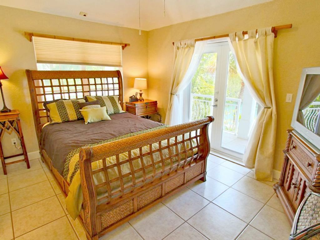Luxury Home with Waterfall Pool, Hot Tub, and Dock Luxury Home with Waterfall Pool, Hot Tub, and Dock