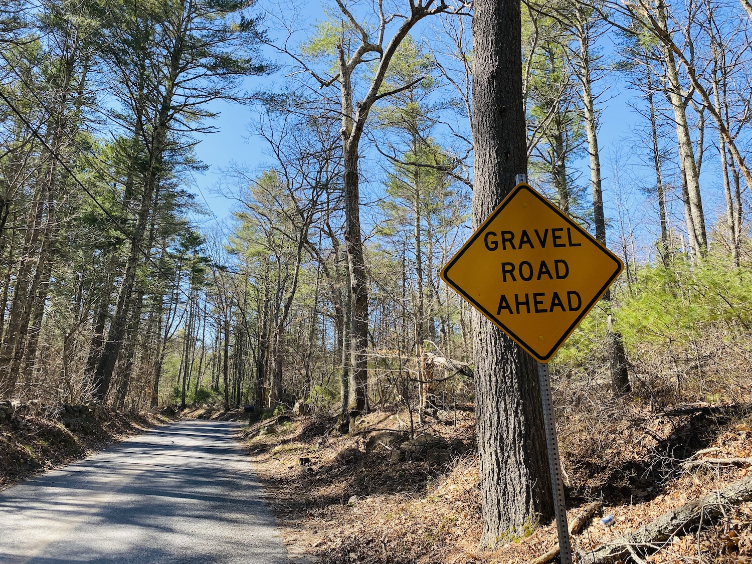 gravel road sign