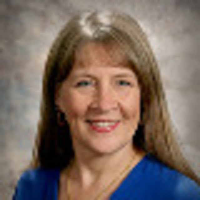 Headshot of Kelly Metcalf