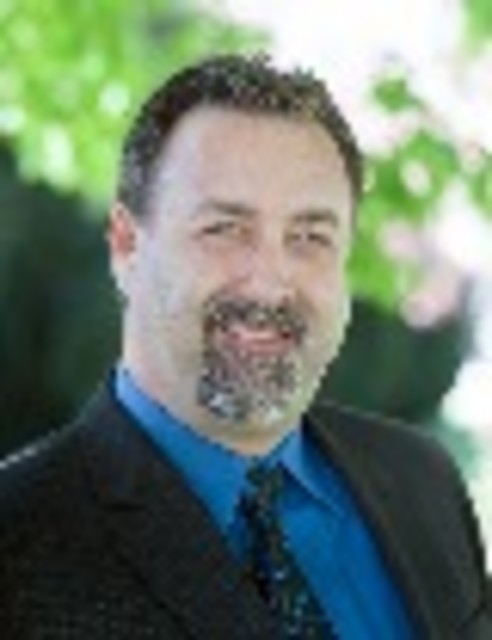 Headshot of Mark Adams