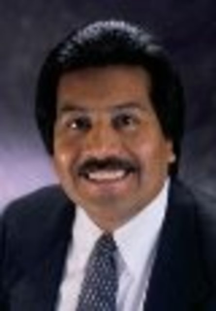 Headshot of John Torres