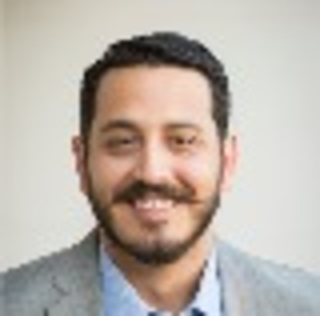 Headshot of Simon Raya