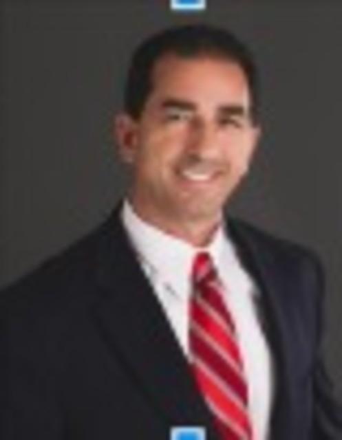 Headshot of Michael Arikat