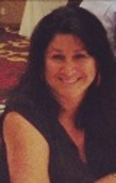 Headshot of Gloria Acevedo-Schenone