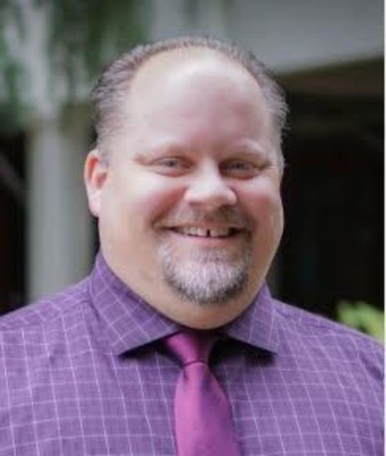 Headshot of Daniel Paulson
