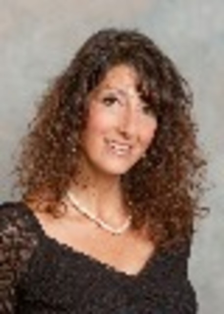 Headshot of Ada De Martini